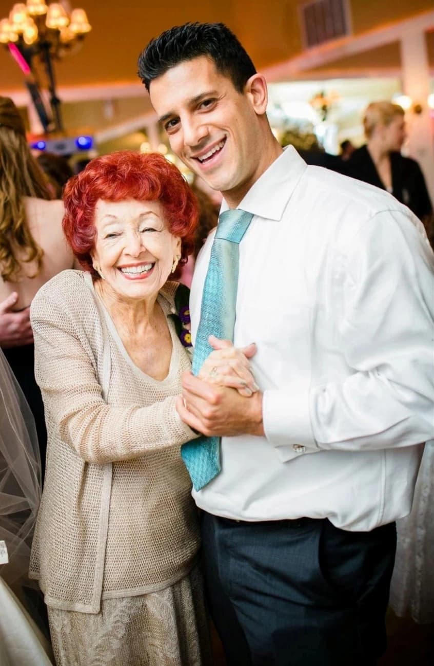 An ageless couple gracefully dancing at a wedding